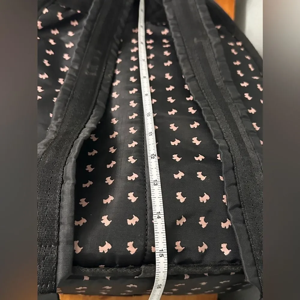 Agatha Paris Black Backpack With Pink Scottie Dog Pattern all over.
